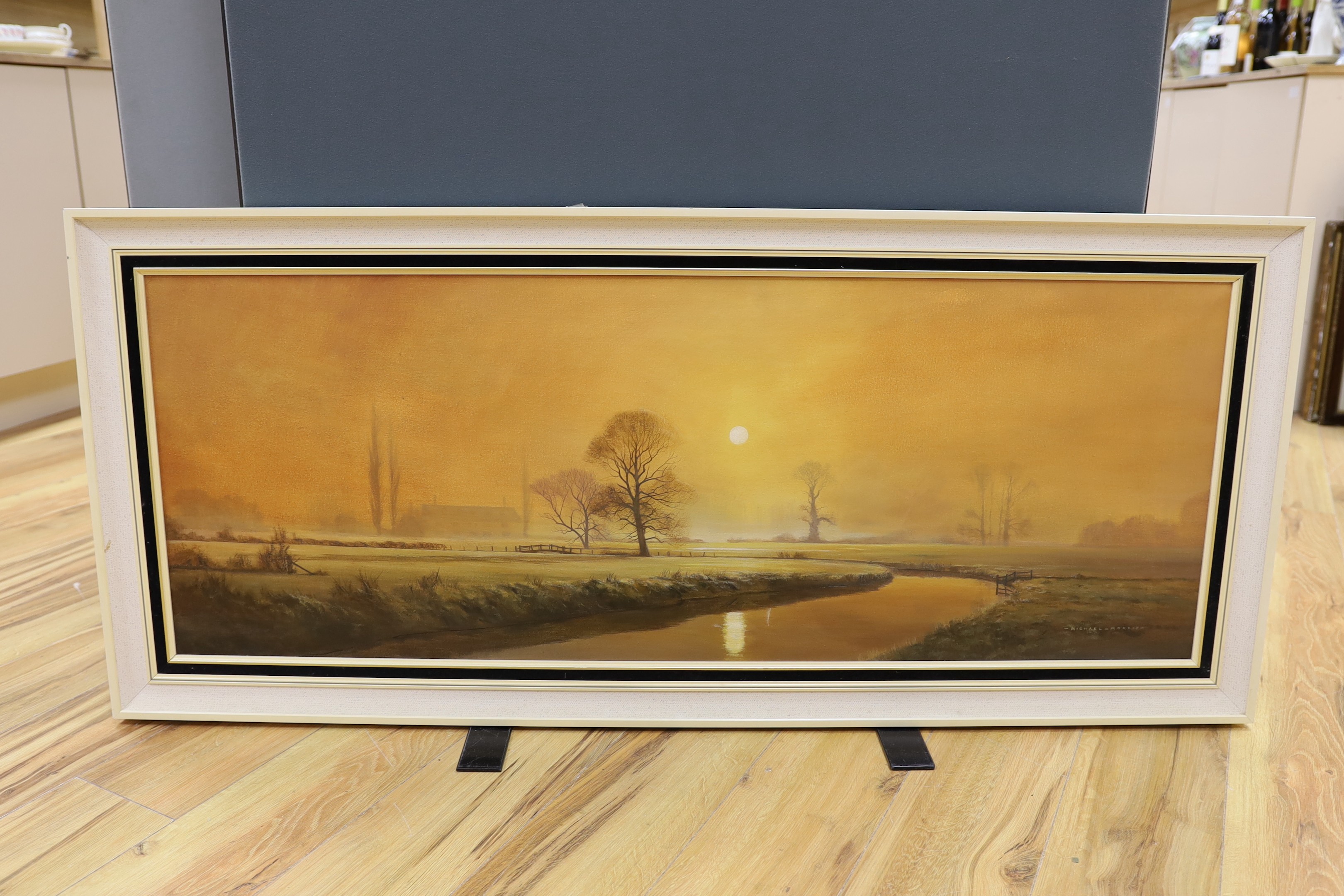 Michael Morris (b.1938), oil on canvas, River landscape at dawn, signed, 44 x 120cm